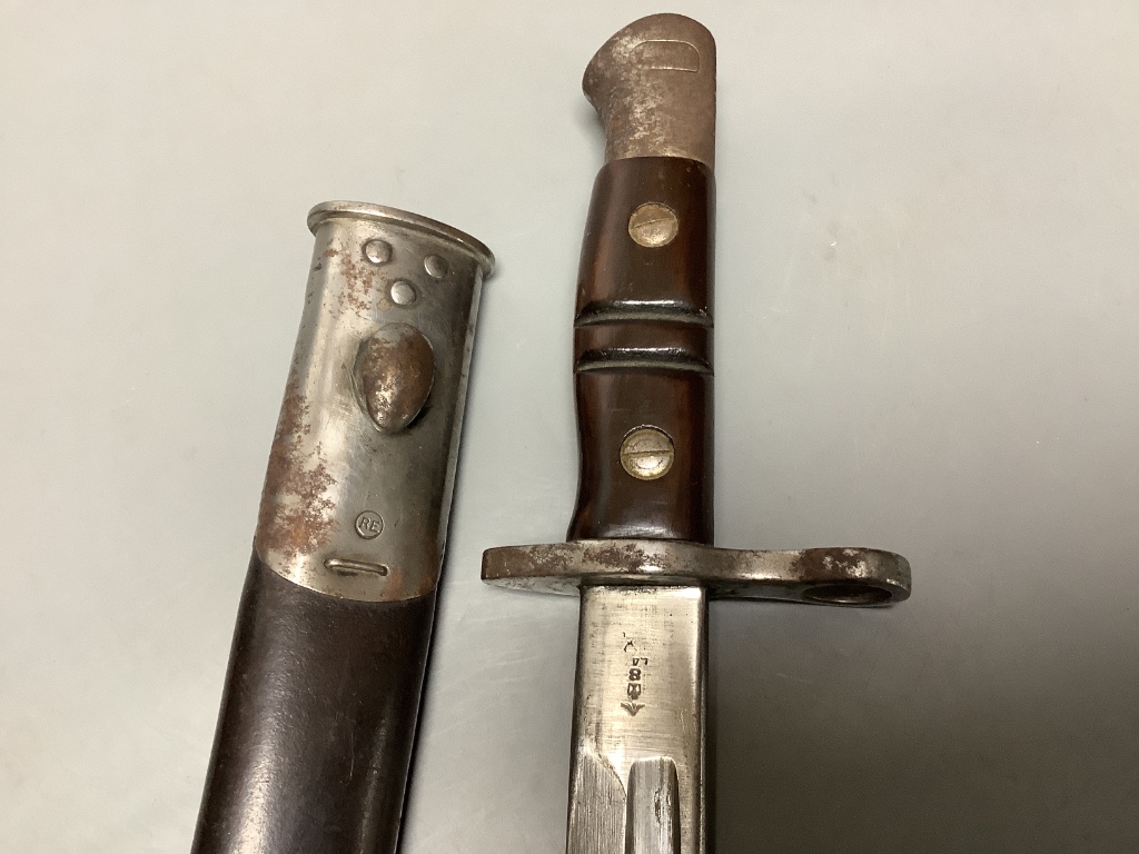 A WWII bayonet, blade marked ‘1913 3 17 REMINGTON’